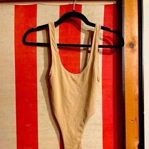 Tan body suit